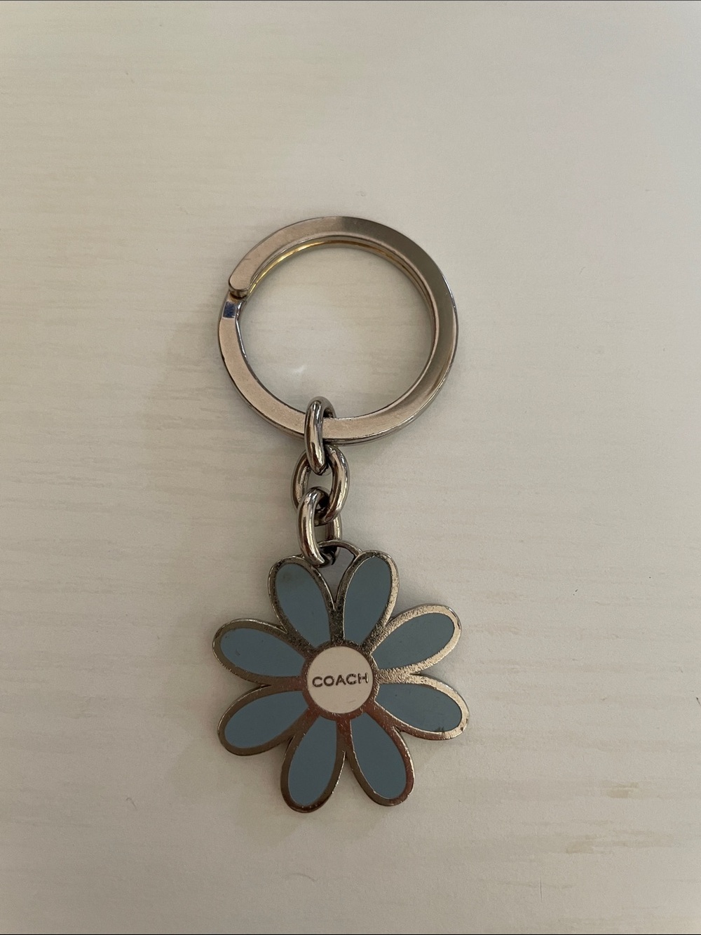COACH Silver/Blue Flower Keychain